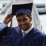 Man holding his graduation cap, 6 month computer course certificate